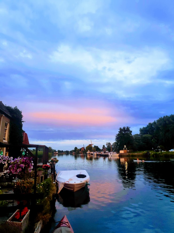 Sunset over the windmills of Weesp